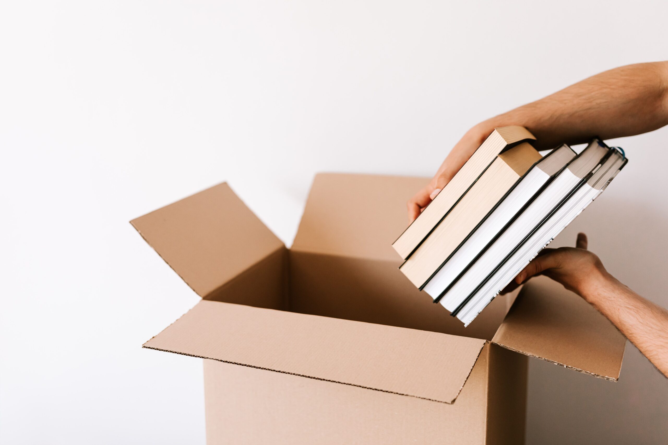 How to Pack Books for Moving Without Wrecking Your Boxes or Your Back